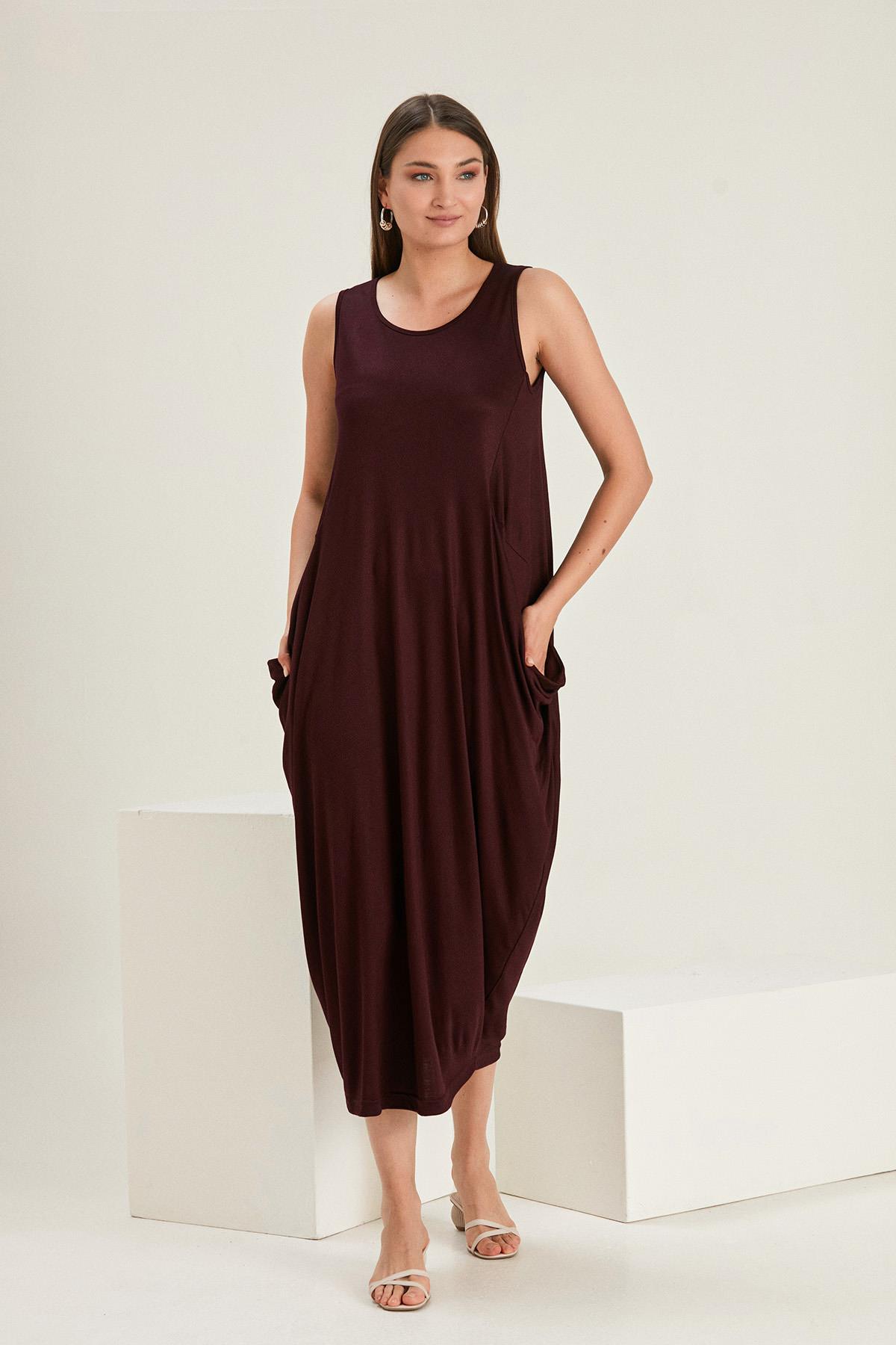 KOLSUZ SALAŞ CEPLİ ELBİSE